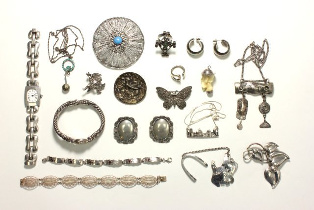 Lot of vintage silver: Including: Joachim S' Paliu silver & ox bone hoop earrings. BJC 14kt gold & silver with amethyst watch. Total 3 watches, 2 pair earrings, 3 bracelets, 6 pendants, 2 necklaces, 2 rings & 1 charm = 21 p