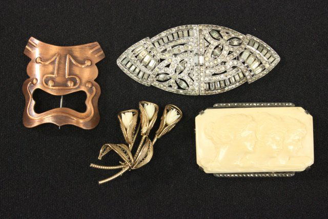 Lot of 4 brooches: Including carved bone & marcasite cameo style pin, copper drama mask pin & Coro Duette pin.