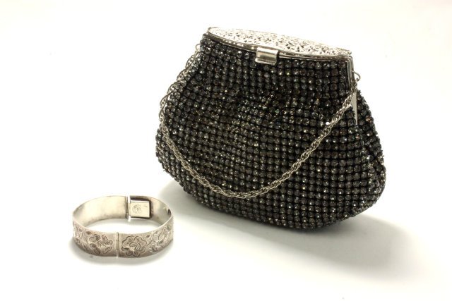 Johan Becker bag & Plateria Covalto bracelet: Vintage Johan Becker evening purse with prong set rhinestones, approx. 5" x 6.5". Plateria Covalto Mexican Niello sterling bracelet with engraved "Roses". Good condition.