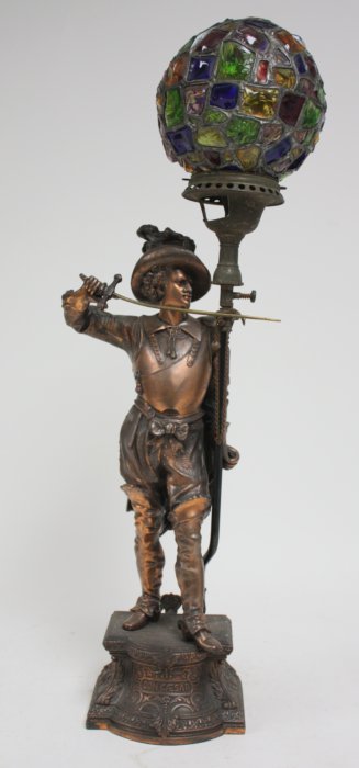 Don Caesar gilt metal sculptural lamp with shade: Chunk glass shade. Approx. 30.25" H.