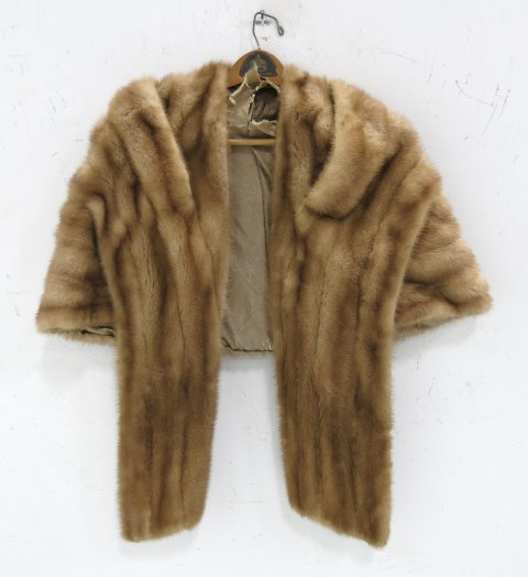 Mink stole: Tan colored. Lining damaged, needs repair.