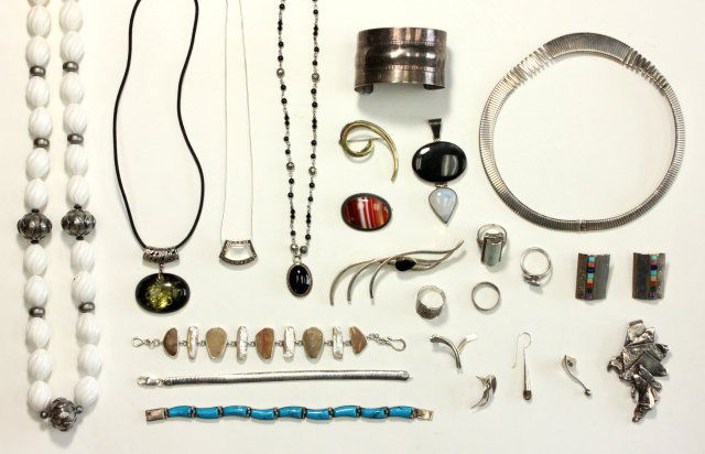 Lot of silver pieces: Including: cuff, pair earrings with semi precious stones, 4 rings, 4 mis-matched earrings, pendant, 3 bracelets - 1 with turquoise, 4 pins, 5 necklaces. Total 24 pieces. Good condition.