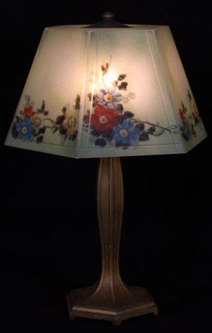 Jefferson reverse painted lamp: 6 panels. Floral wreath design around bottom. Ice chip finish. Sea green background. Signed Jefferson on rim. TEE painted on interior of shade. #6284. Approx. 24" H x 16" D (shade). Good condition. Ma