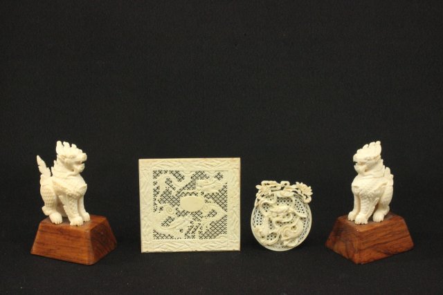 Group lot of Chinese bone items: Including: Pair "Foo Dogs" mounted on base & 2 reticulated plaques. Tallest approx. 4.25" H. From a LI, NY estate. Good condition.