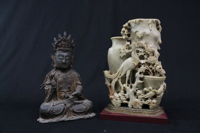 Seated antique bronze Buddha & soapstone carving: Bronze Buddha approx. 11.5" H. Soapstone carving mounted on brass & wood base, approx. 14" H. Buddha is very worn, Chips on soapstone carving.