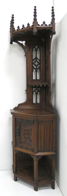 Gothic oak corner cabinet: Approx. 102" H. 28" deep.