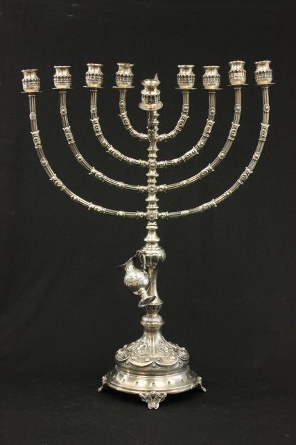 Large sterling silver menorah: cup needs to be repaired, 26"h X 19 1/2"w, APPROX. 78 OZT