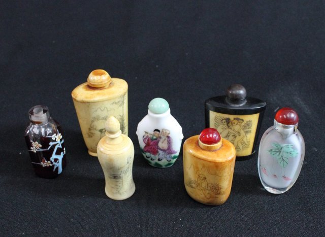 Group lot of 7 Chinese snuff bottles: Including: Bone, ebony & bone, porcelain & glass. Some with erotic motif, some signed. From a LI, NY estate. One missing stopper.
