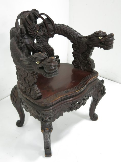 Hand carved Asian throne chair with dragon heads: Approx. 33" H x 27" W.
