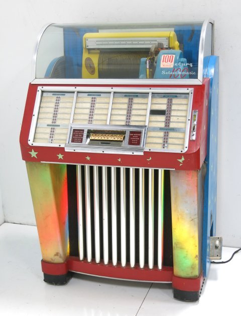 Seeburg Select-o-matic 100 jukebox: Plays 45 discs. From an Ocean, NJ private collection. Lights up, but doesn't play. Short in the wire.