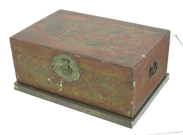 Chinese scarlet lacquer leather chest: Mounted by Tommi Parzinger. Approx. 16" H x 41" W x 30" D. Provenance, Nathan & Janet Appleman Commission Ocean, NJ 1956. Gilding worn, lacquer chipped.