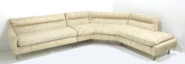 Modern sectional sofa with bronze legs: Approx. 31" H. Some legs marked, upholstery worn in areas.Ca. 1965