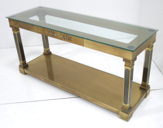 Mastercraft brass console table: Label veros of frieze. Approx. 26" H x 54" W x 17.5" D. Slight pitting in some areas. Ca. 1970