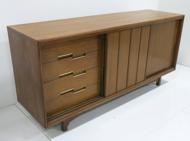 Cavalier Mid-century walnut dresser: Approx. 34" H x 72" W x 21" D. Front stretcher cracked, minor scratches.