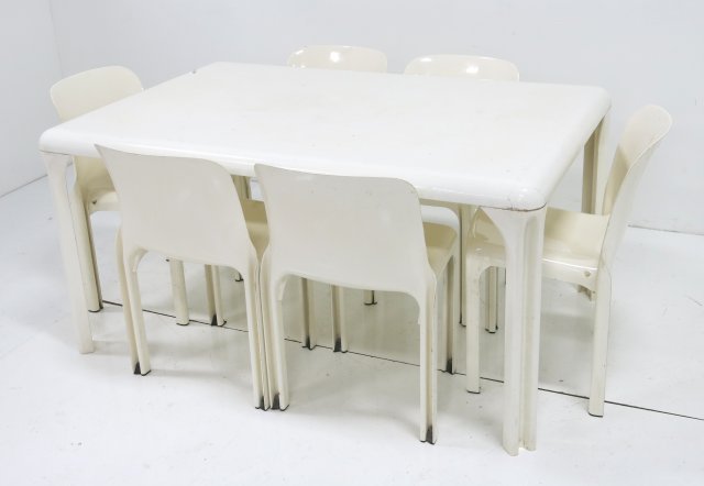 Vico Magistretti for Artemide table & 6 chairs: White fiberglass. Ca. 1970. Chairs approx. 29.5" H, table approx. 26" H x 55.5" W x 36.5" D. Good condition.