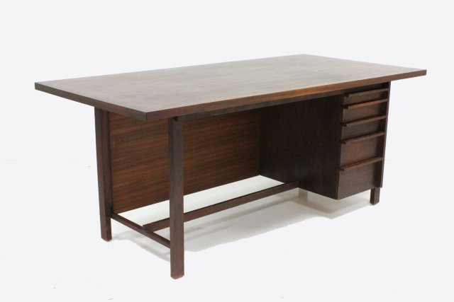Nakashima style walnut & pandanus desk: Approx. 29.25" H x 72.5" W x 34" D. Repair with fill on top surface, 1" x 1/2" . Slight wear on feet & pulls & front of desk edge from use.