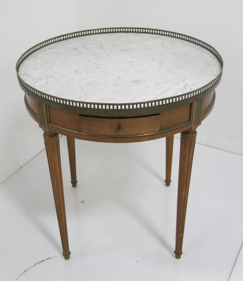 Louis XVI style marble top bouillotte table: Brass gallery, marble top. Approx. 28" H x 26" D. Good condition.