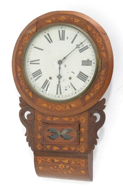 American inlaid Victorian walnut wall clock: With pendulum. Approx. 28" L. Paint wear on face.