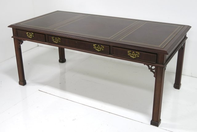 Sligh leather top mahogany office desk: 3 section, top gold tooled leather. Approx. 36" D x 72" across. Cracking in leather.