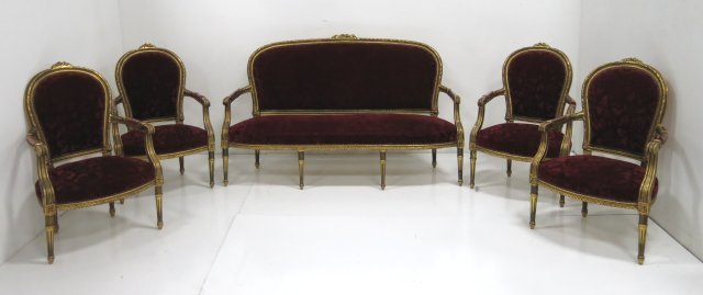 1920 Giltwood Louis XVI style salon set: Red velvet fabric, 5 pieces in total. Sofa approx. 62" W x 20" D x 44" H at back. Very good condition.