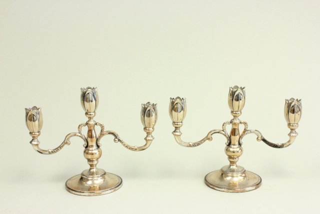 Pair Fisher sterling silver weighted candelabra: 3 arm, "Tulip" shaped. Approx. 8" x 10.5". Minor denting on bottom underneath.