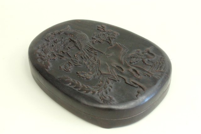 Chinese inkstone in wood case: Good condition.