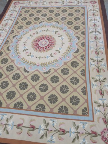 Aubusson rug with center medallion: Circa 1960s-1970s. Approx. 10' x 16'.