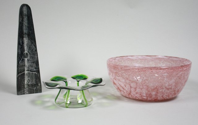 2 art glass bowls & Kosta glass obelisk: Red bowl, approx. 5" H x 11" D. Green/clear "Hat" shaped bowl, approx. 3" x 8". Obelisk approx. 12" H, signed Kosta 95691.