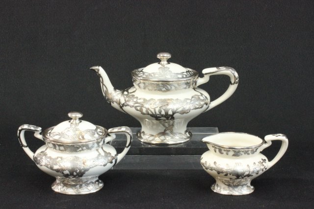 Lenox porcelain & sterling silver overlay tea set: 3 pieces including tea pot, creamer & sugar.