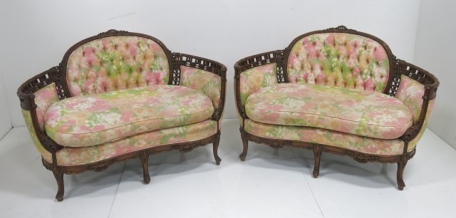 Pair Settees carved frames: Approx. 35" H x 53" W x 31" D.