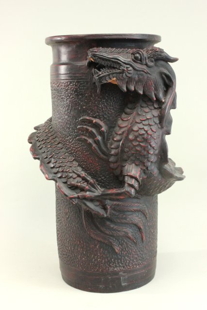 Japanese terracotta umbrella stand: Dragon motif. Approx. 24" H. From a private NJ estate. Chips along face.
