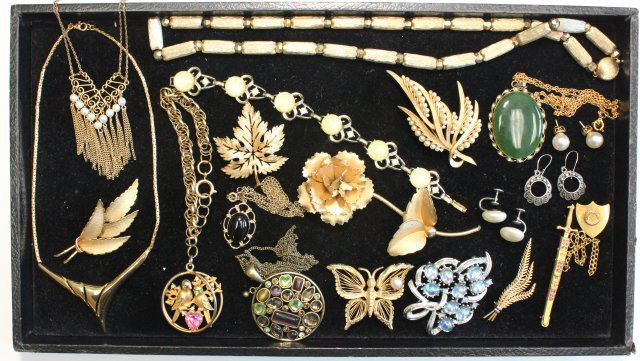 Vintage costume jewelry: Including, Coro charm bracelet & Monet. Good condition.