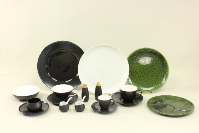 Modern German Part Dinner Services: Including 7 green plates, 7 black plates, 4 black & white plates, & matching tea/coffee cups & saucers. (4034) Property of a lady, UN Plaza, NYC. Chips & wear.