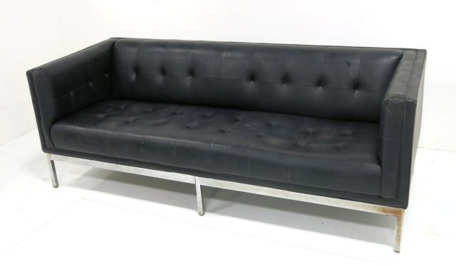 Knoll style sofa: Upholstered in black leatherette. Approx. 29" H x 79" W x 31 1/2" D.