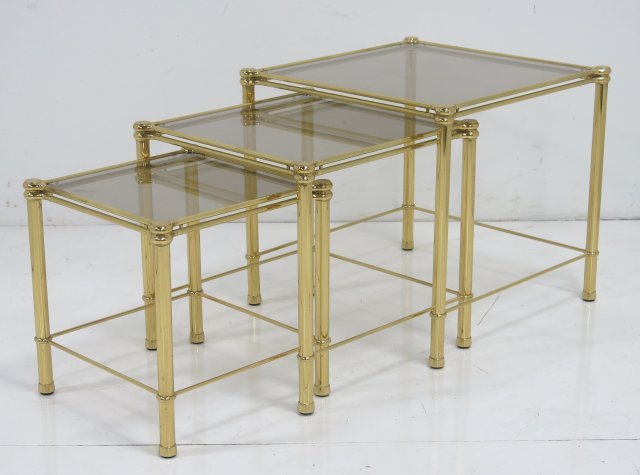 Nest of 3 Italian brass side tables: Circa 1970. Side tables with smoked glass labeled. Made in Italy. Approx. 19 1/4" H x 20 3/4" W x 20 3/4" D.
