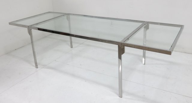 Milo Baughman glass top chrome table: Approx. 36" x 60" x 28" with two approx. 20" leaves. Minor scratches