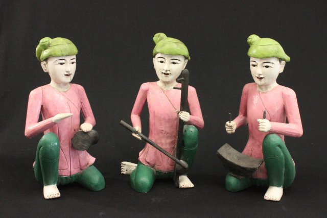3 carved wood & painted Balinese musicians: 20th century. Approx. 15 1/2" H. Some wear & losses.