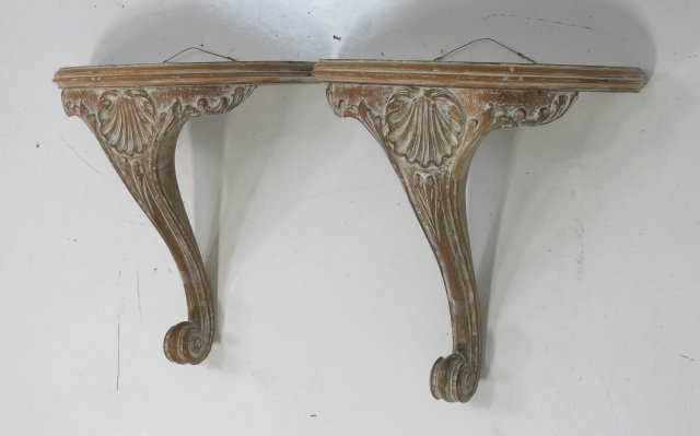 Pair of Bleached French Demilune Wall Brackets: Carved with shell design on front. Approx. 15 1/2" H x 15 1/2" W x 7" D. (039330C)