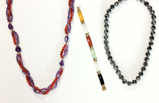 Two strands of beads & bracelet w/14kt clasps: Gold beads and Amethyst with 14kt clasp, along with bracelet with 14kt clasp, jade, quartz, onyx and carnelian. 29", 16" and 6" long