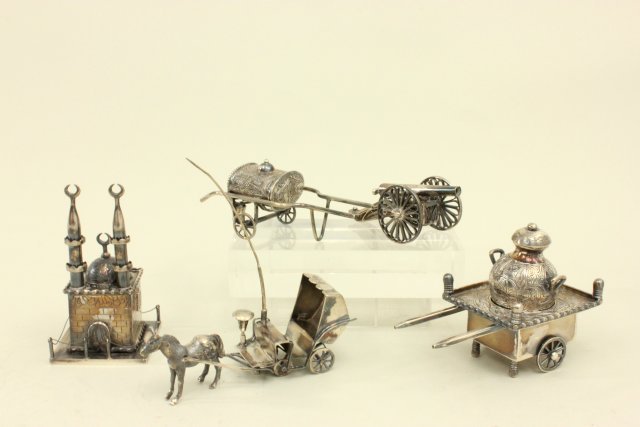 5 Cabinet size silver pieces: Middle eastern of Persian marks including a mosque, cannons, horse and buggy, cart with covered urn, cart with containers with spigot. total wt. 18.6 ozt, 578.7 gm (4034) Property of a lady from UN Pl