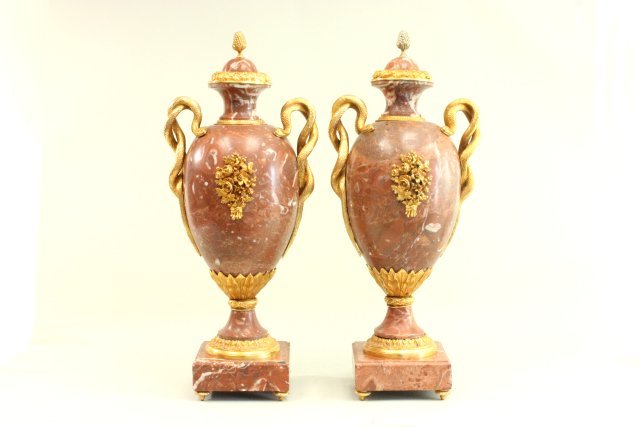 Pair bronze mounted marble cassollettes: Snake handles, rouge marble. Approx. 27 1/2" H. Good condition.