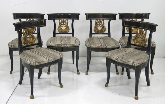 Set of 6 chairs: Black & gold with swan head backs. Cane seat with tie down cushions. Approx. 33" x 19 3/4" W.