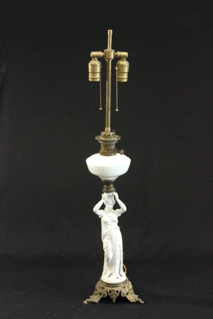 French Parian Figural Lamp: Classic figure of a lady mounted as a lamp. Approx. 33" high , figure - 10 1/2" high. Some repairs.