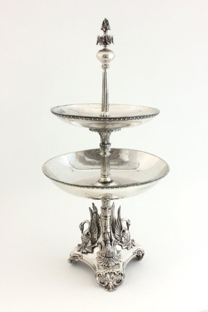 English Silver Plated 2-Tier Serving Tray: Base depicts 3 swans & foliate tripod base & top. Approx. 21" H. From a NYC collector's 40 year compilation.