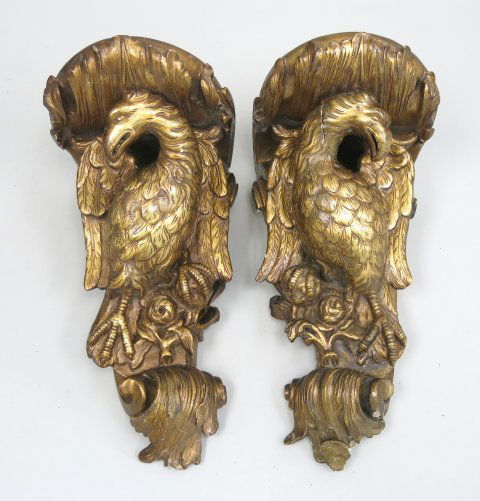 Pair George III style giltwood brackets: Eagle motif. Chipped. Losses. 1 cracked neck.