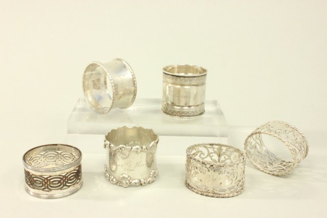 Lot of Sterling and Silver Plate Napkin Rings: 6 pieces total.