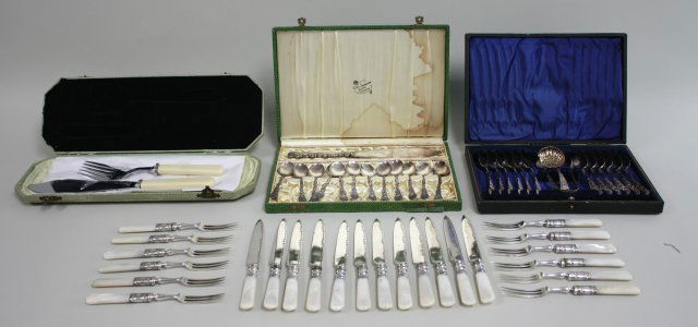 Mother of Pearl Knives & Forks, Serving Set & More: Mother of Pearl forks & knives, service for 12, serving set in fitted case, set of 12 demitasse spoons & knife in fitted case & set of 12 demitasse spoons & two serving pieces in fitted case. Approx.