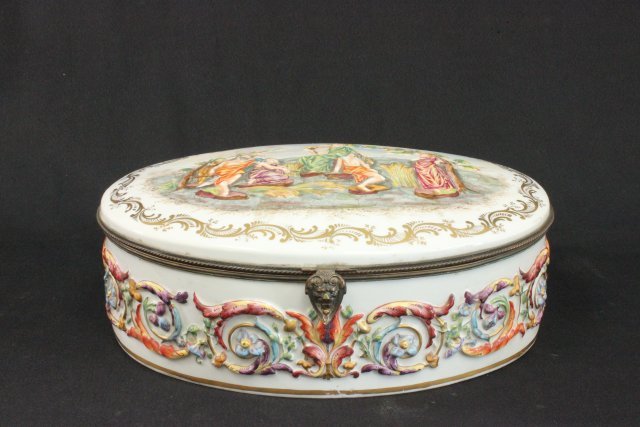 Large Capo di Monte Porcelain Jewelry Casket: With courting scene on cover & flowers around it. Approx. 6" H x 15 1/2" L x 12" D. From a NYC collector's 40 year compilation.