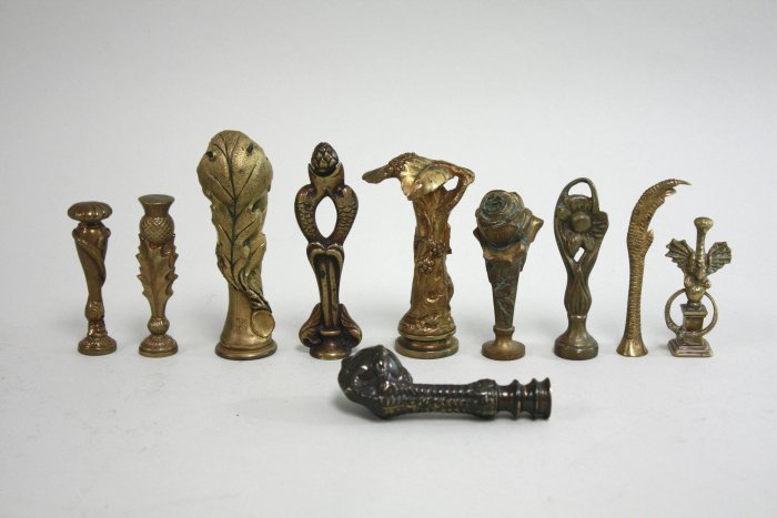 Group of 10 bronze & meal foliate seals (1 of 8)