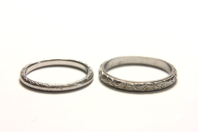 2 Platinum Wedding Bands with Etched Designs: Approx. 3.7 dwt.